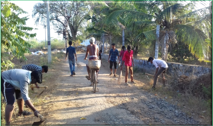 Road Cleaning by for better environment by NSS volunteers at Ponparappipatty Village
